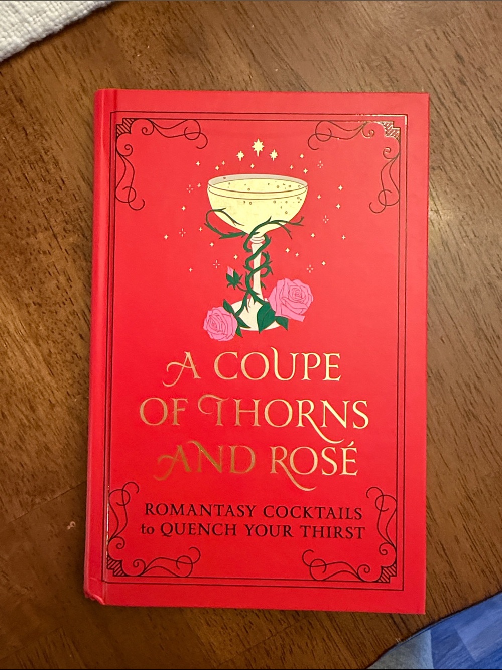 A Coupe of Thorns and Rosé Cocktail Recipe Book - Red